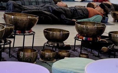 Sound bath meditation with traditional hand made Himalayan bowls at Vitality Lounge in Bothell, WA